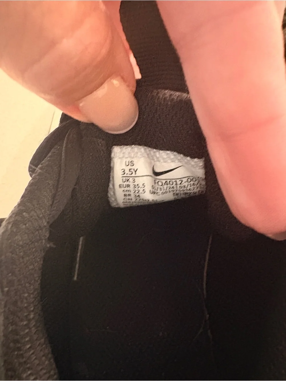 Nike Kids Black Sneakers with White Swoosh